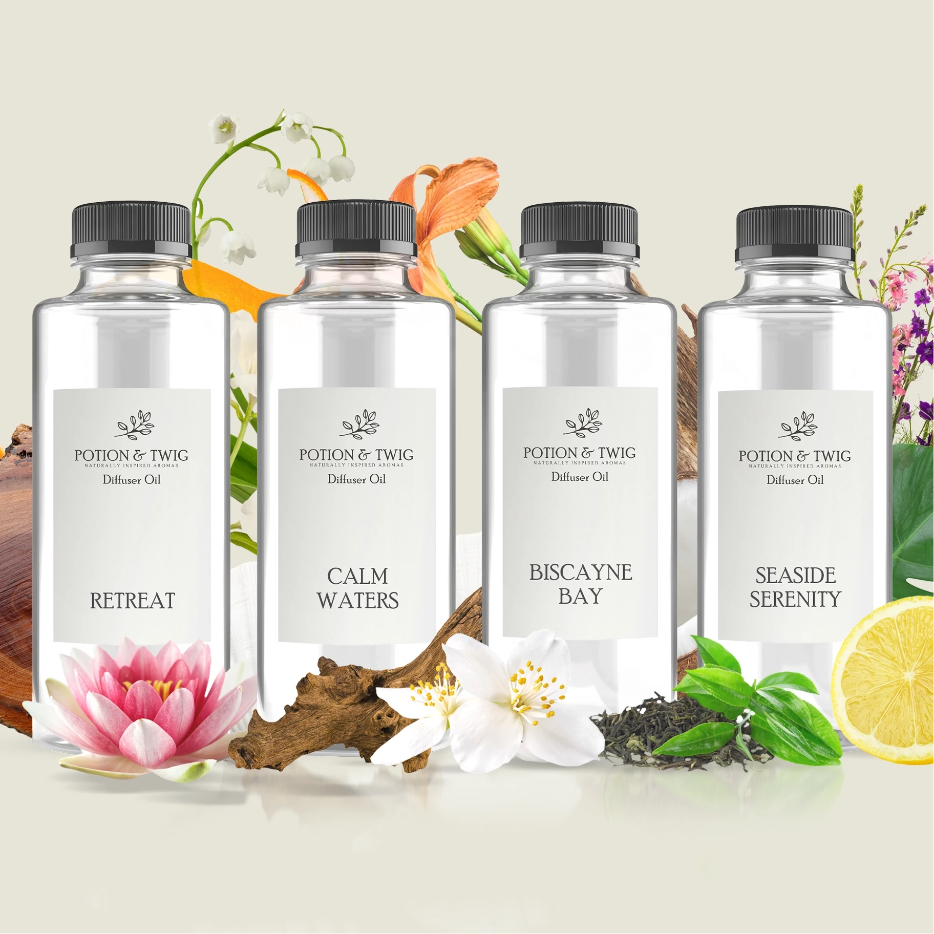 Four bottles of Potion & Twig diffuser oil with floral and natural elements on a light background