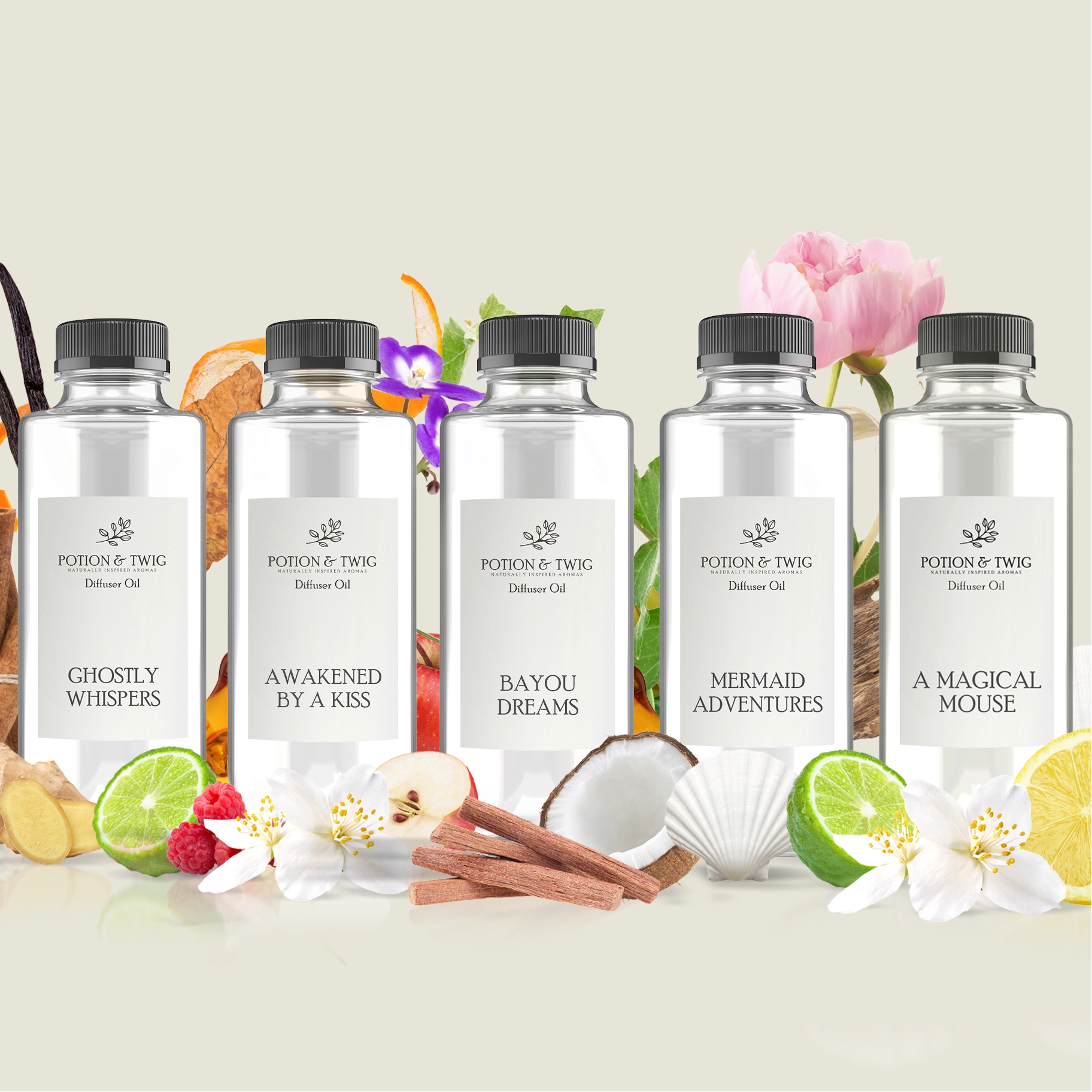 Five bottles of Potion & Twig diffuser oil with labels "Ghostly Whispers", "Awakened by a kiss", "Bayou Deams", "Mermaid Adventures", "A Magical Mouse" with scent notes in the background