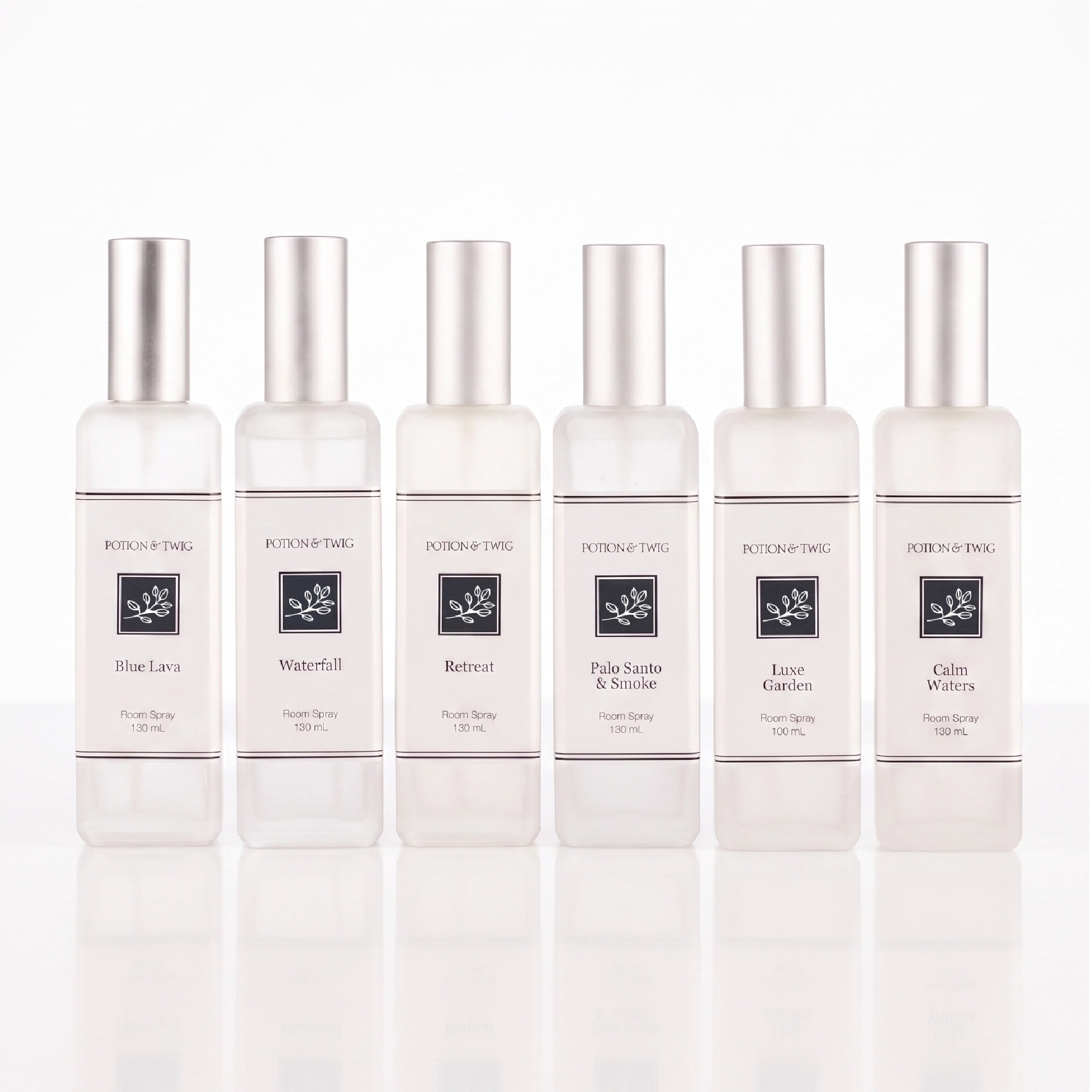 Six Room Spray bottles with different fragrances all by Potion & Twig on a white background
