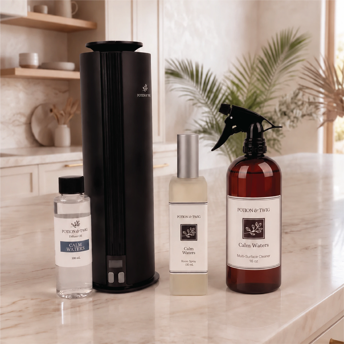 Four Potion & Twig products, featuring a Calm Waters 16 oz Multi-Surface cleaner, Calm Waters 130mL room spray, a spire diffuser with a Calm Waters 100mL oil bottle sitting on a countertop in a kitchen.