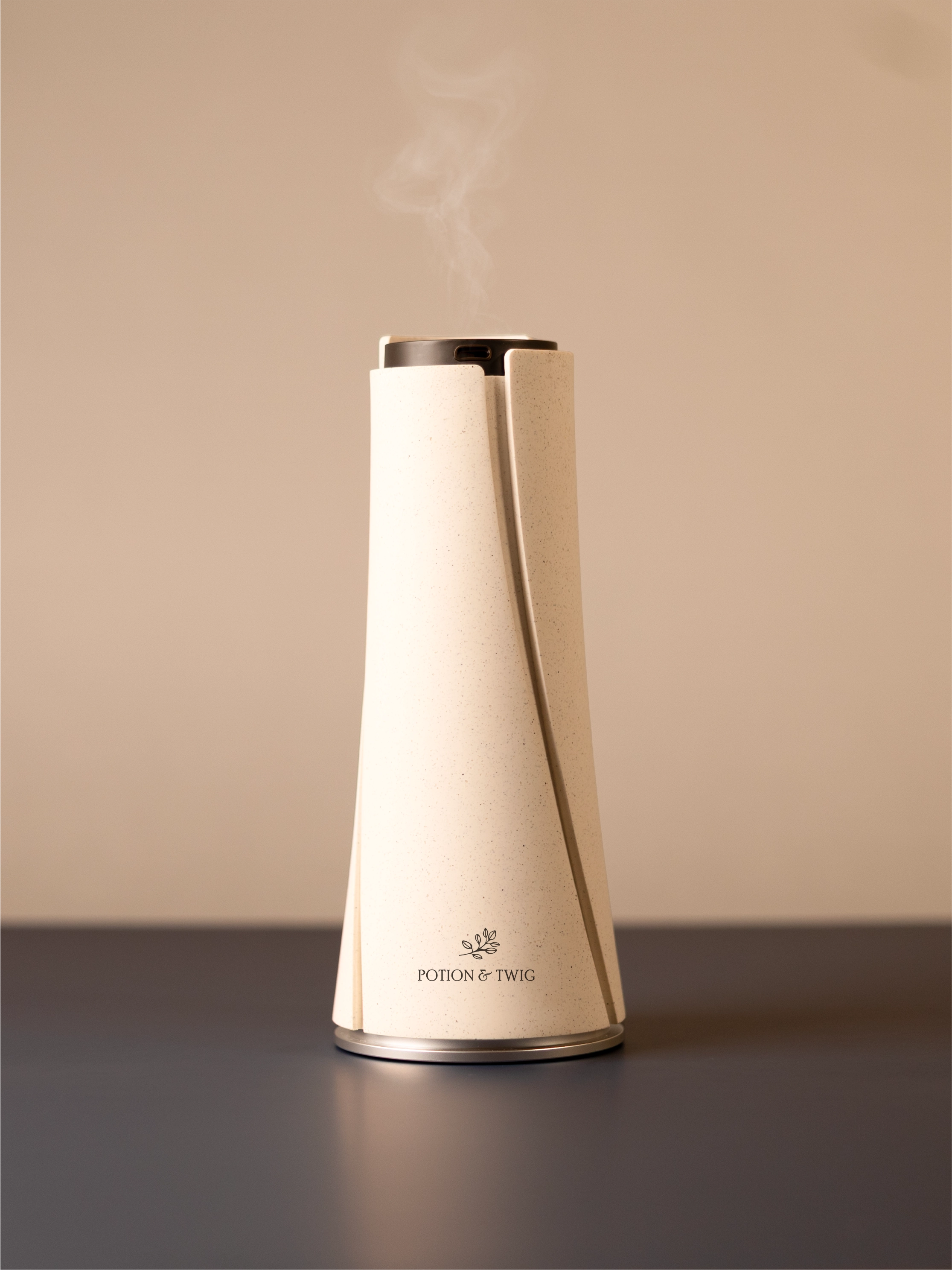 White Lumen scent diffuser on light neutral background