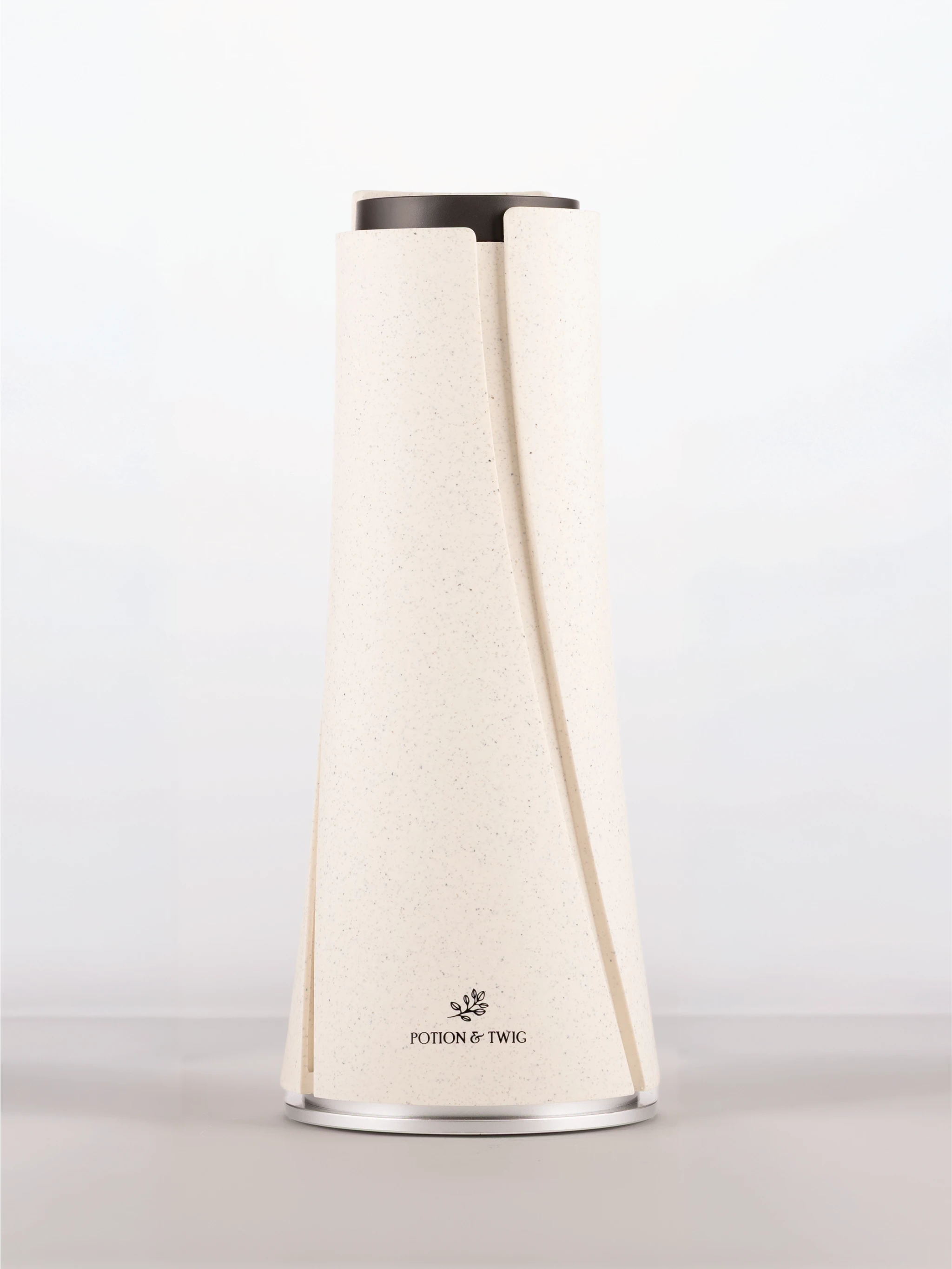 White cylindrical scent diffuser with 'Potion & Twig' brand logo on a white background