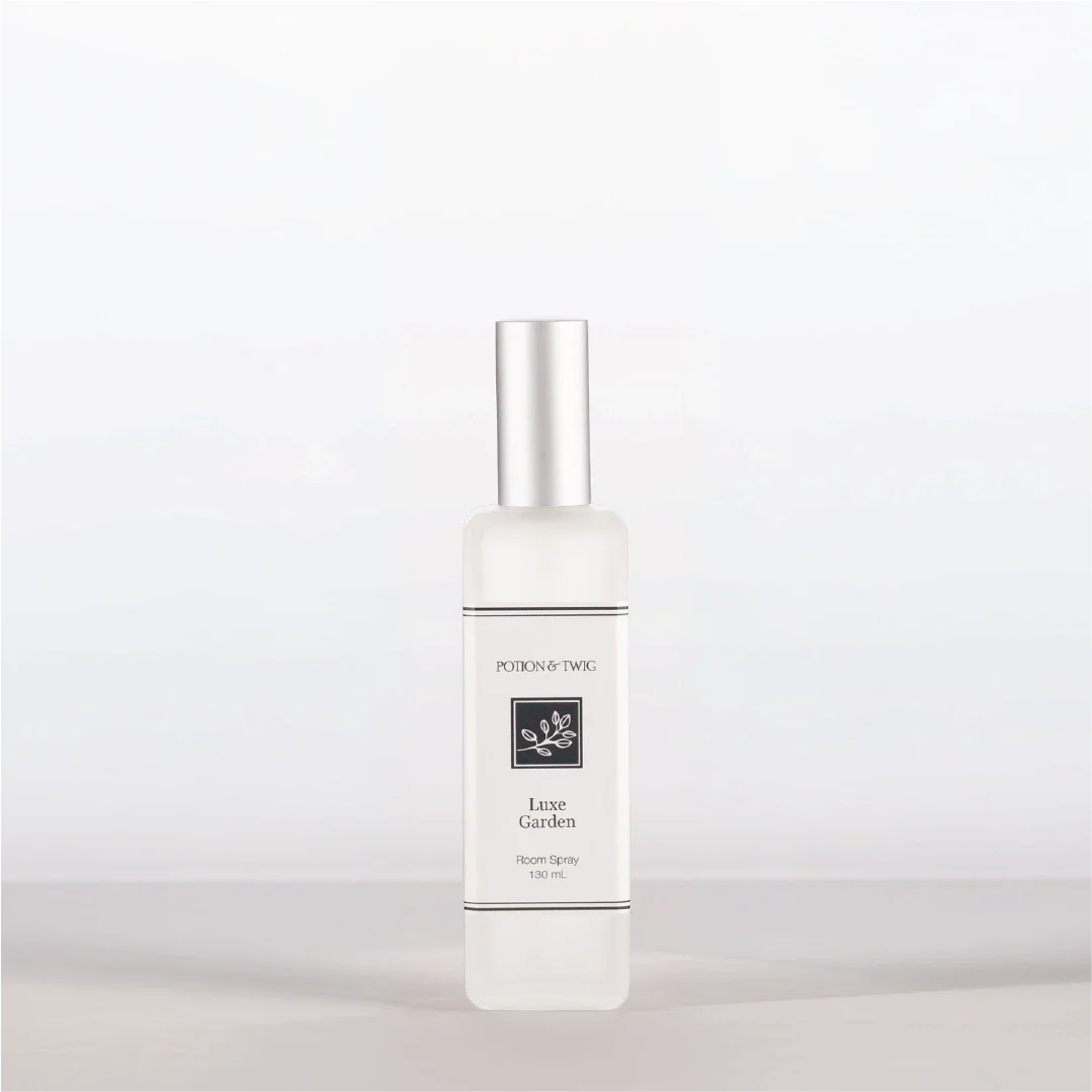 Room Spray bottle labeled 'Luxe Garden' by Potion & Twig on a white background