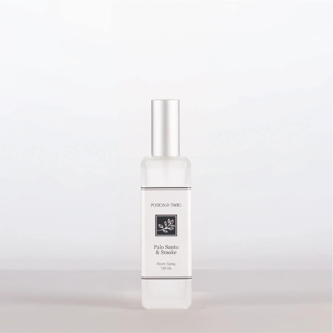 Room Spray bottle labeled 'Palo Santo & Smoke' by Potion & Twig on a white background