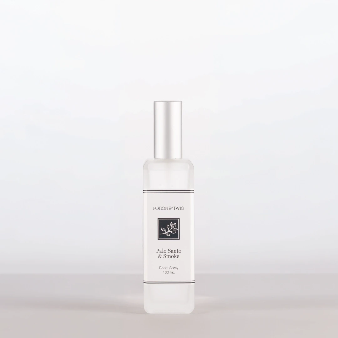 Room Spray bottle labeled 'Palo Santo & Smoke' by Potion & Twig on a white background