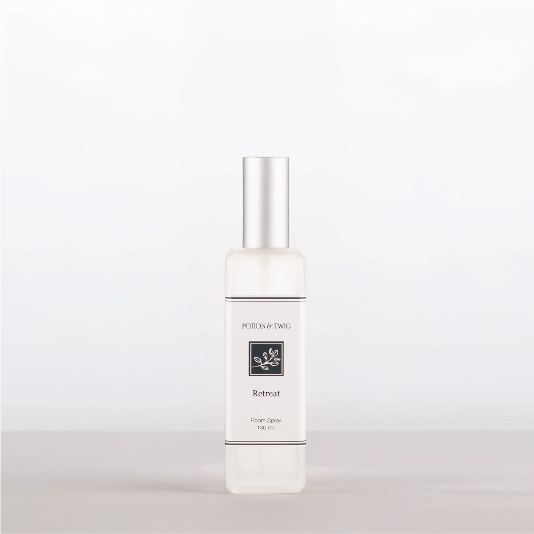 Room Spray bottle labeled 'Retreat' by Potion & Twig on a white background