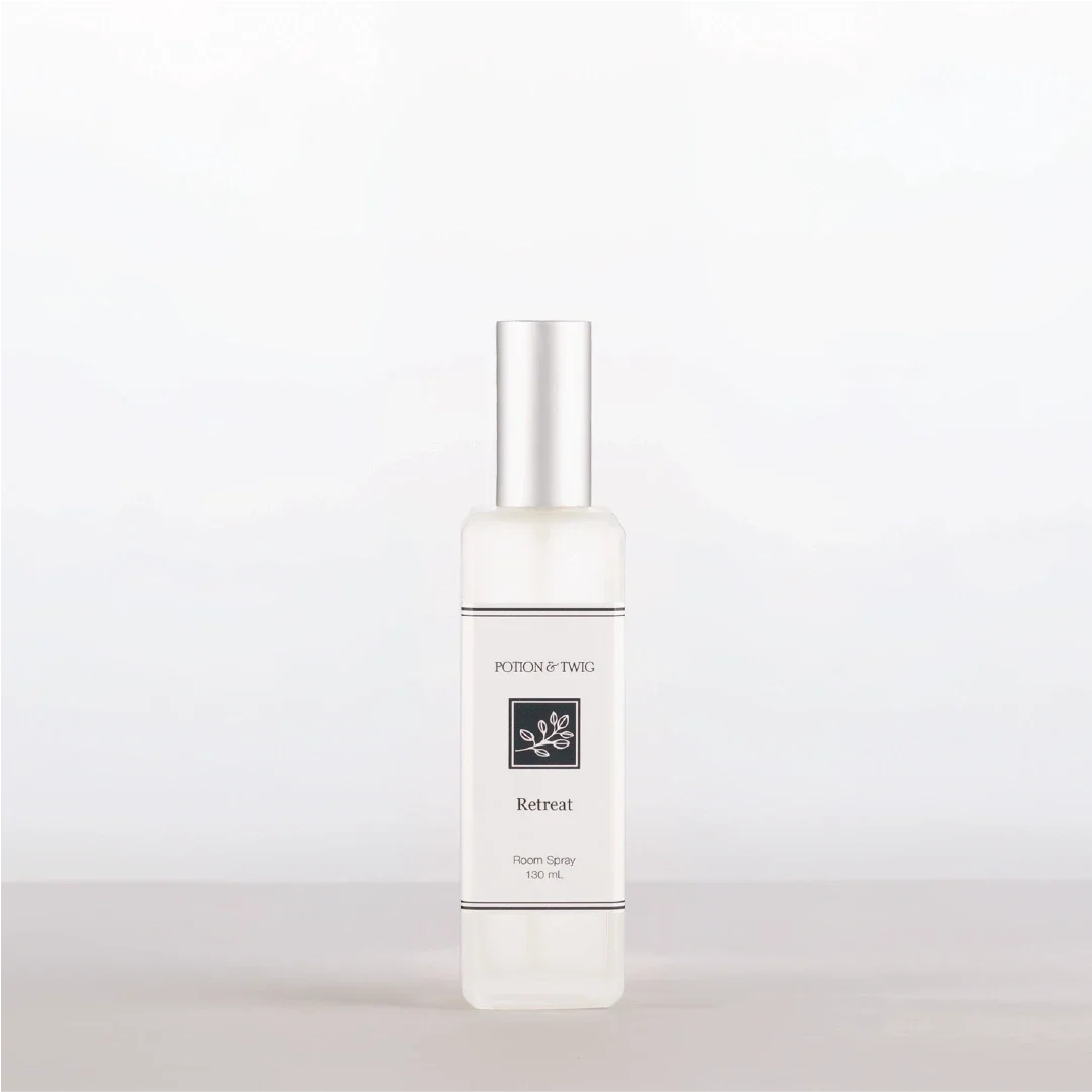 Room Spray bottle labeled 'Retreat' by Potion & Twig on a white background