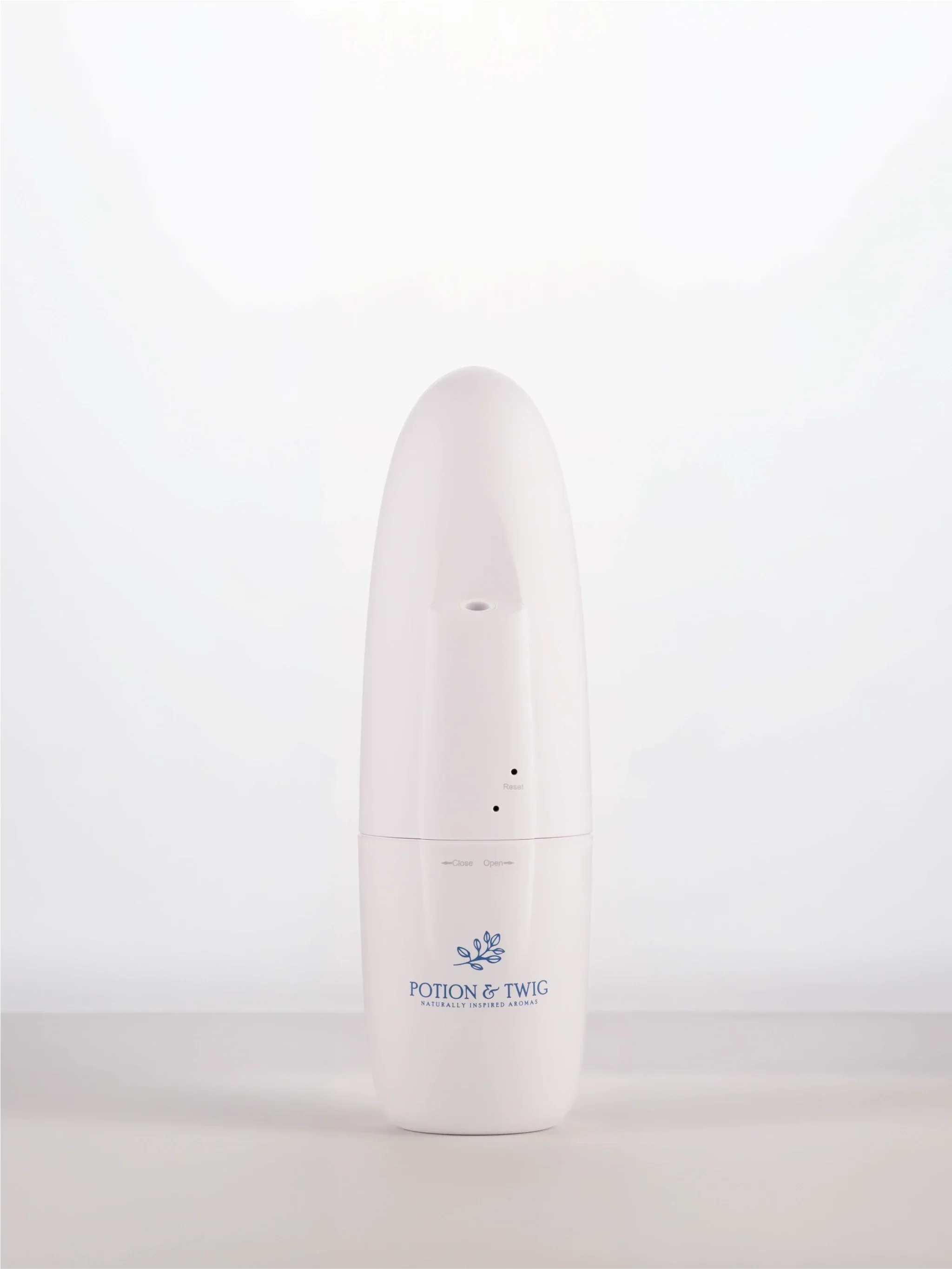 Sienna Diffuser wall plug in diffuser with a logo on a white background