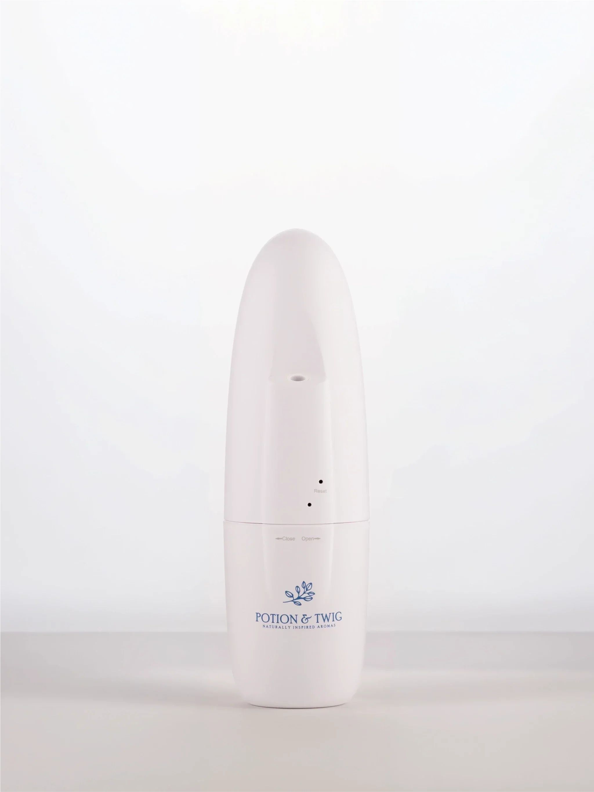 Sienna Diffuser wall plug in diffuser with a logo on a white background