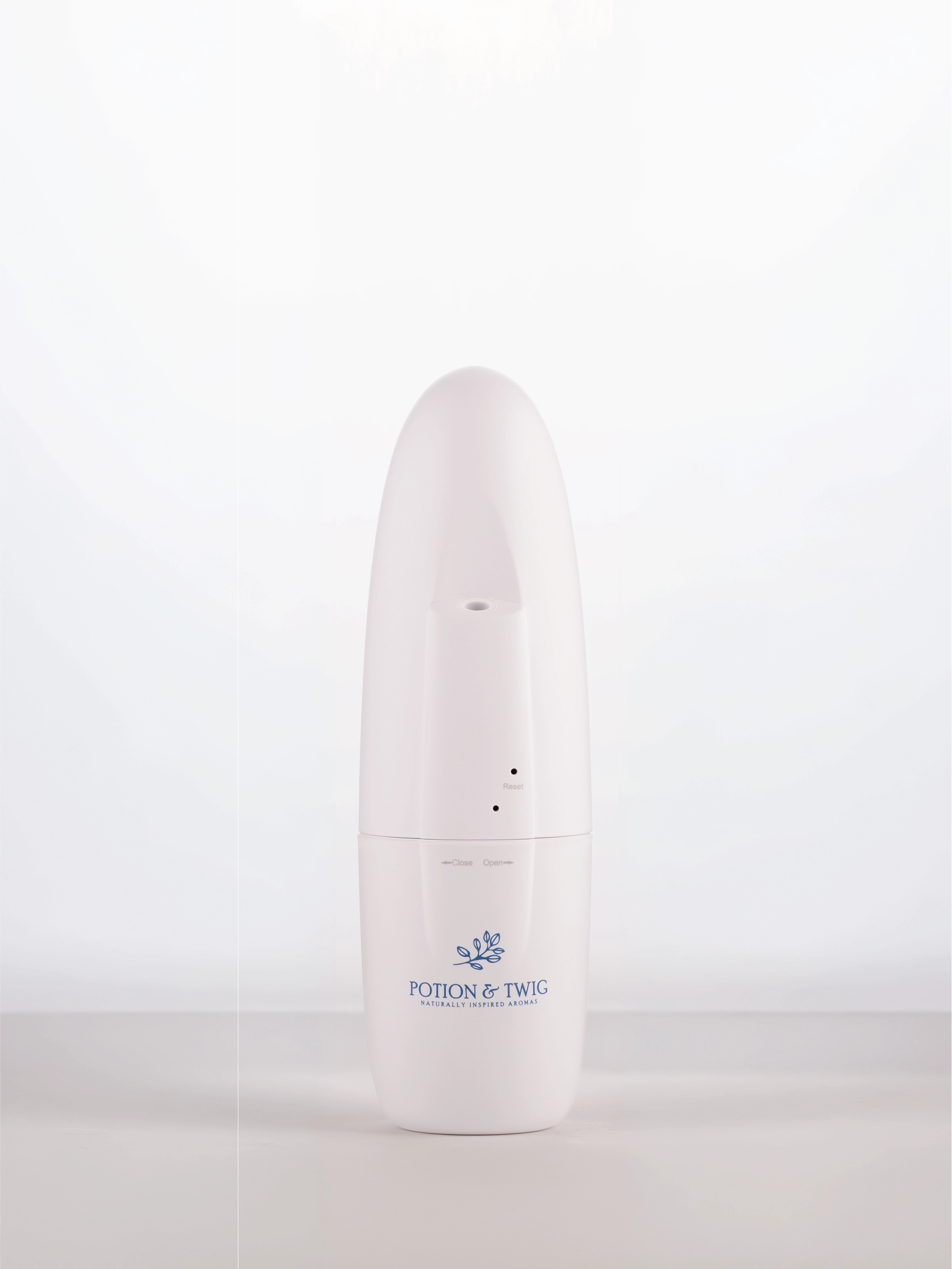 White cylindrical wall plug in diffuser with a logo on a white background