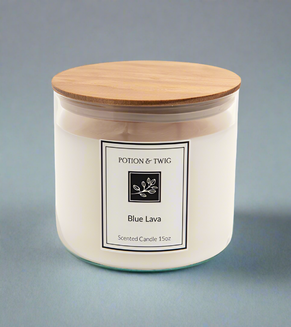 Blue Lava 15oz. three-wick candle in a white glass jar with a natural wood lid and minimalist label