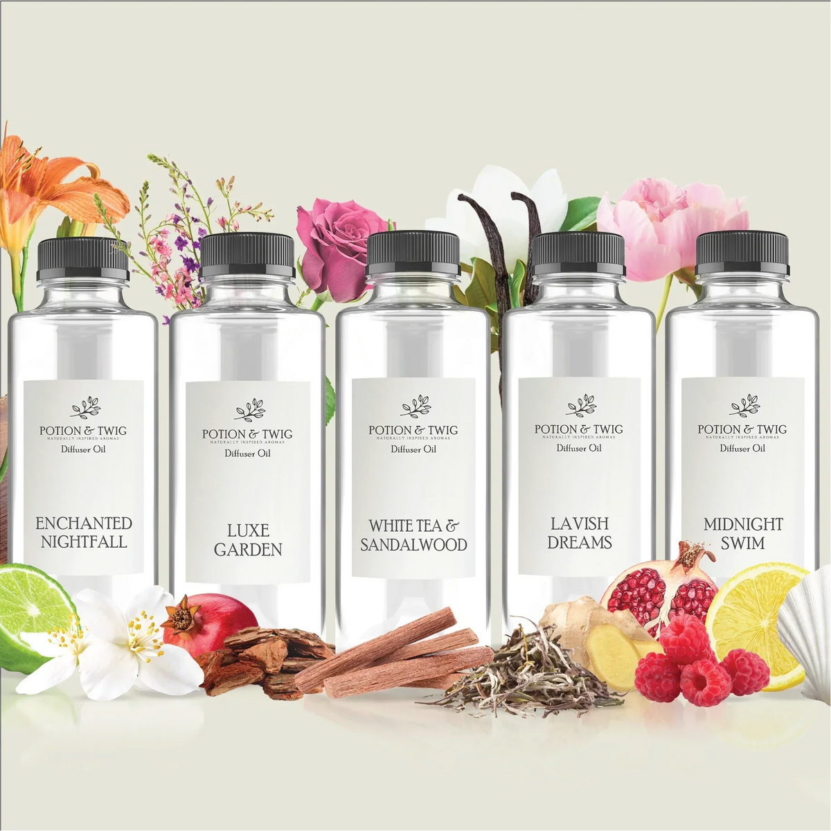 Hotel Lobby Classics fragrance set of five clear diffuser oil bottles with black caps and white labels, featuring botanical scents.