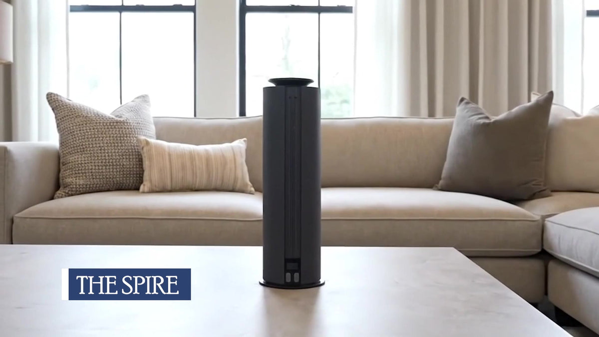 Spire diffuser on a coffee table in a bright living room