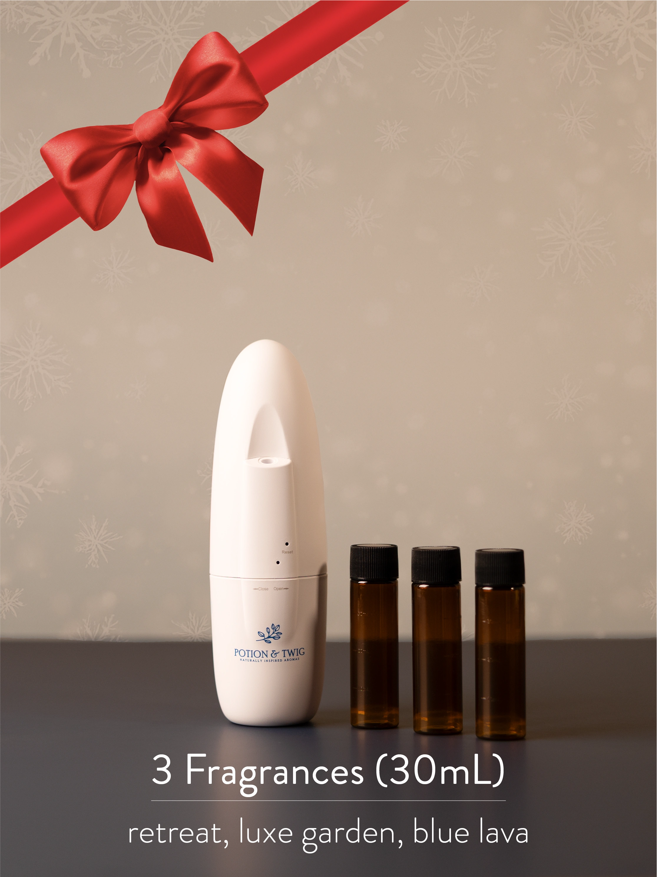 White 'Sienna' Scent Diffuser with 3 amber bottles of oil named, 'Retreat', 'Luxe Garden', 'Blue Lava'