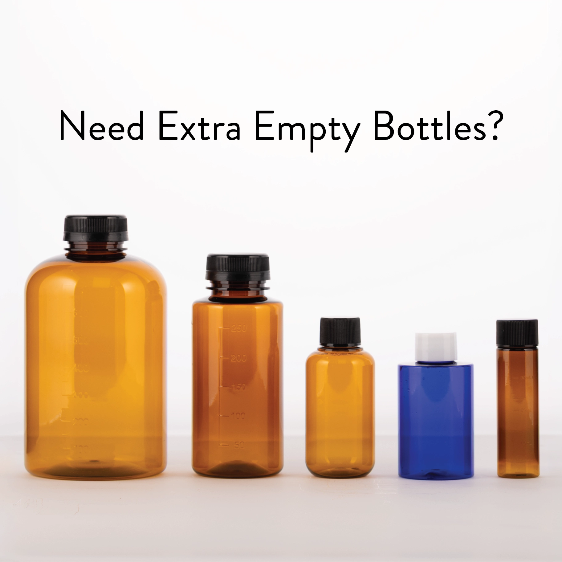 5 empty diffuser oil bottles. 4 amber 1 blue with the text 'Need Extra Empty Bottles?' on a white background