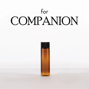 Brown bottle with black cap on a white background with 'for Companion' text.