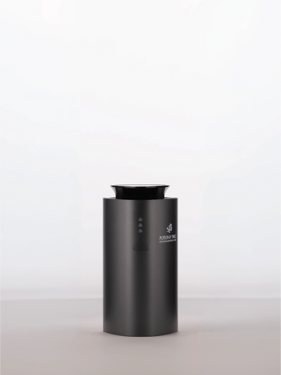 Black cylindrical scent diffuser with 'Potion & Twig' brand logo on a white background