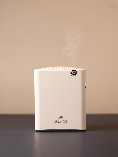 White square shaped scent diffuser on light neutral background