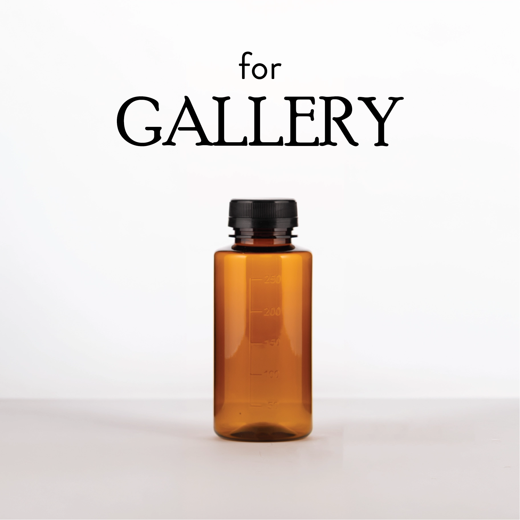 Brown bottle with black cap on a white background, featuring the text 'for GALLERY'.