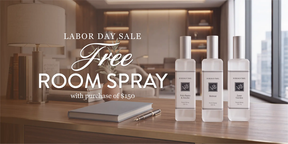 Three Potion & Twig branded room spray bottles lined up on a wooden table in a softly lit room, with promotional text reading 'LABOR DAY SALE Free ROOM SPRAY with purchase of $150' overlaid at the top.