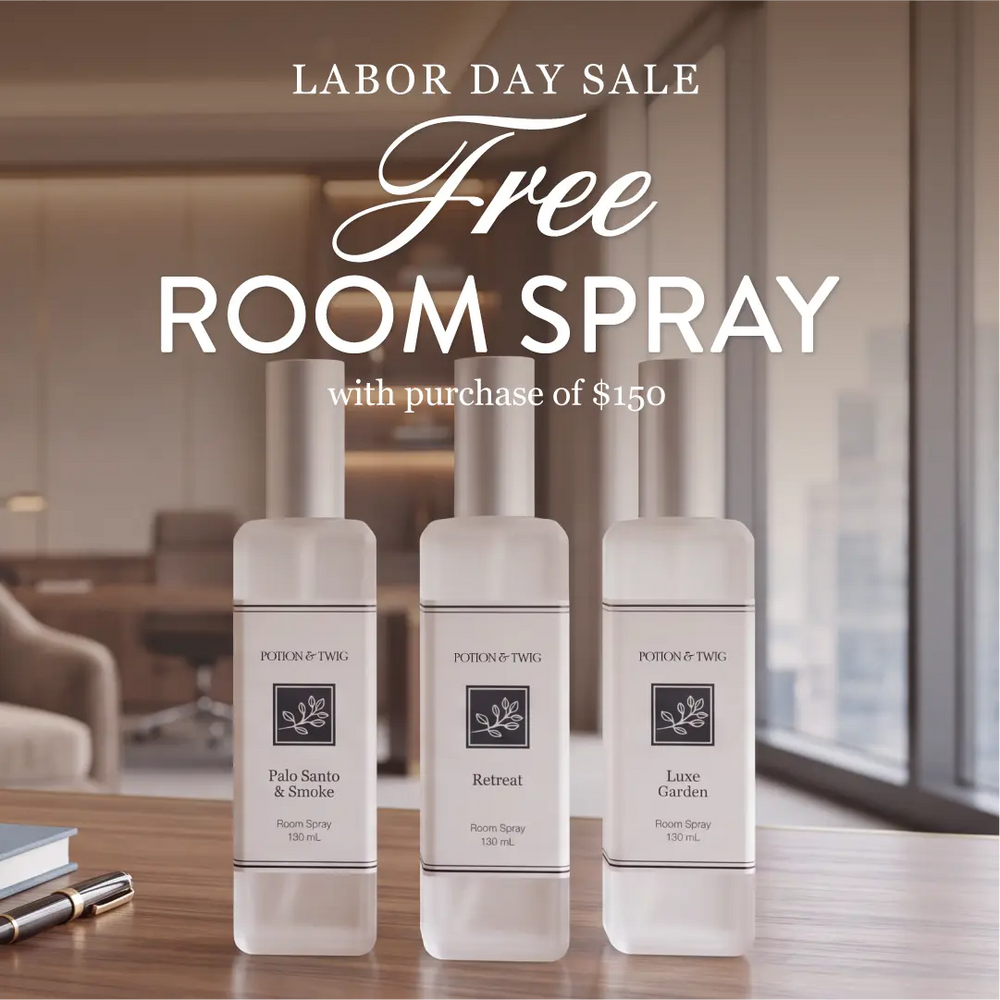 Three Potion & Twig branded room spray bottles lined up on a wooden table in a softly lit room, with promotional text reading 'LABOR DAY SALE Free ROOM SPRAY with purchase of $150' overlaid at the top.