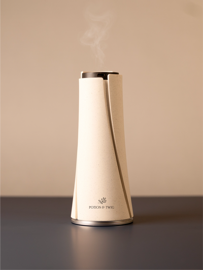 White Lumen scent diffuser on light neutral background