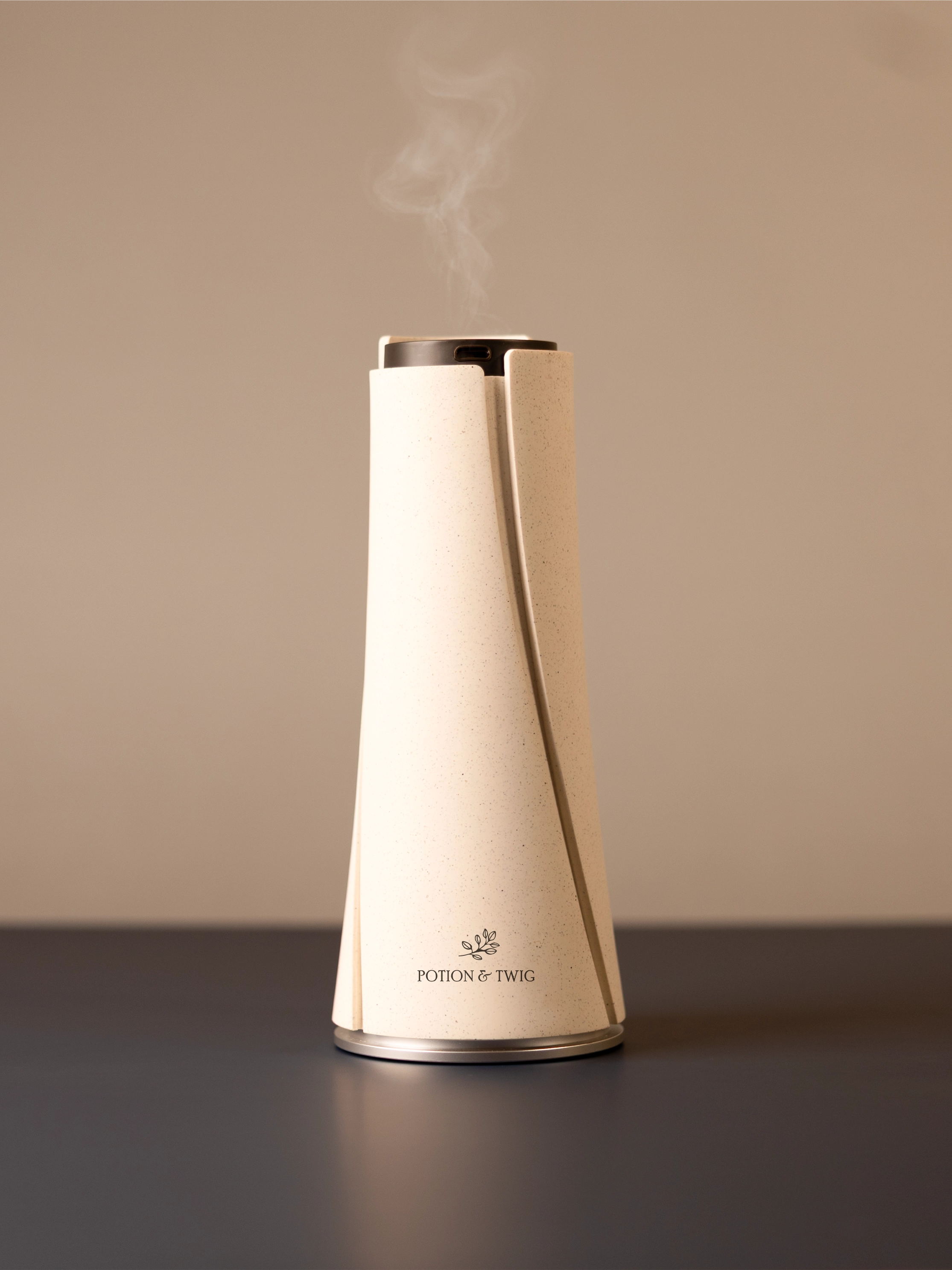 White Lumen scent diffuser on light neutral background