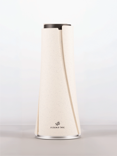 White cylindrical scent diffuser with 'Potion & Twig' brand logo on a white background