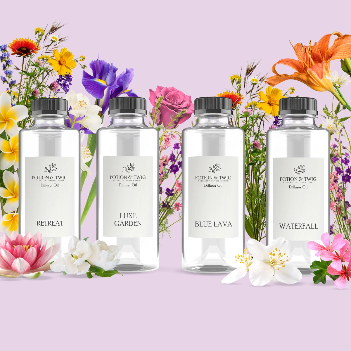 Four diffuser oil bottles with labels 'Retreat', 'Luxe Garden', 'Blue Lava', and 'Waterfall' surrounded by flowers on a pink background.