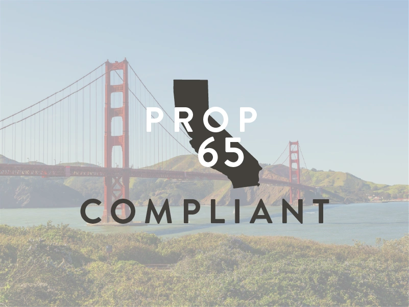 Golden Gate Bridge with 'Prop 65 Compliant' text overlay