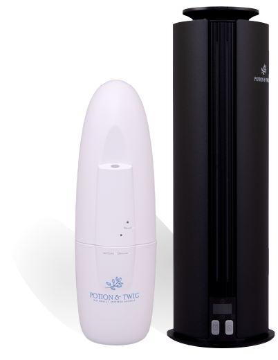 White and black scent diffusers with Potion & Twig branding