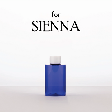 Blue bottle with white cap on a light gray background, featuring 'for SIENNA' text.