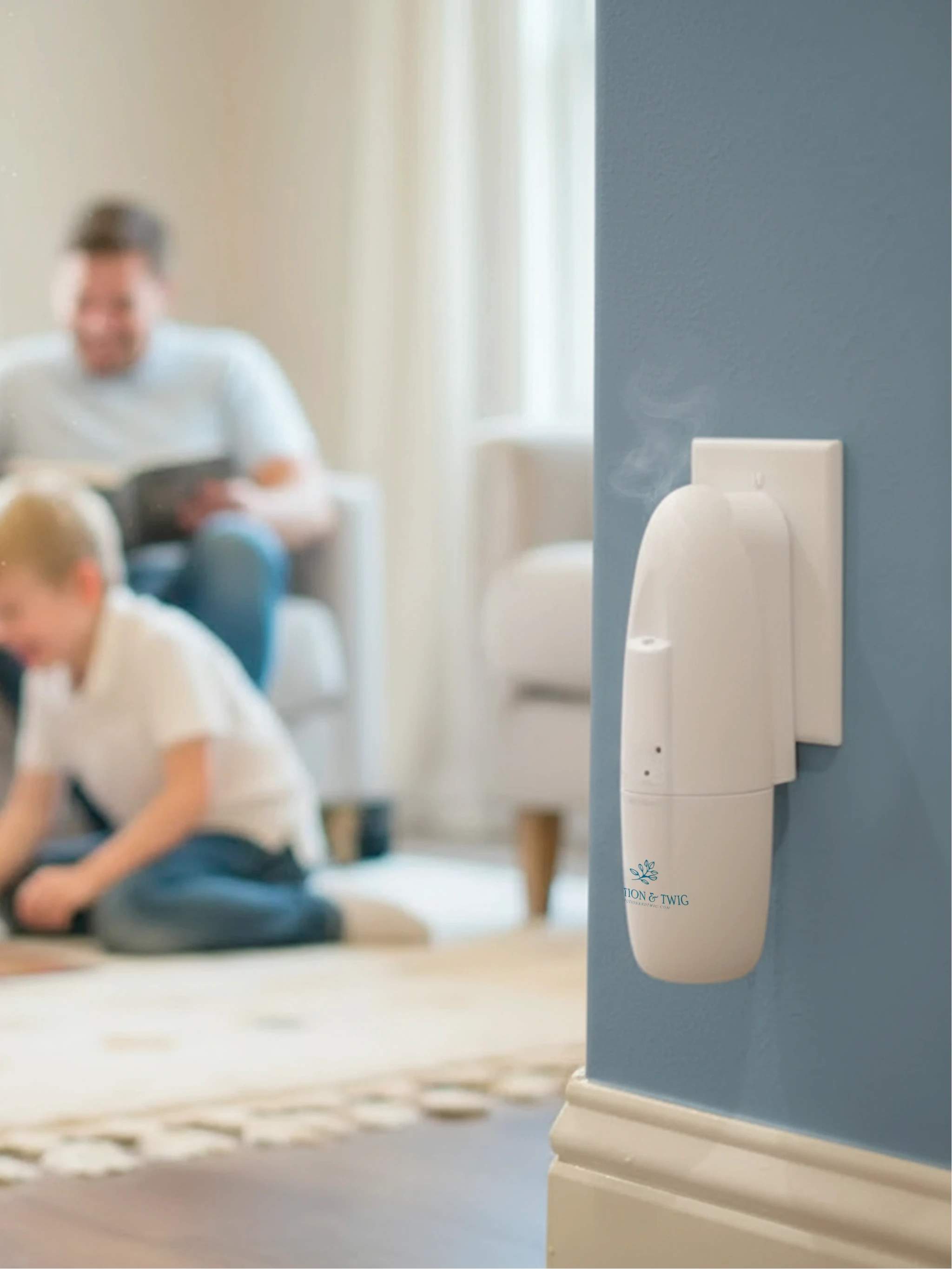 Sienna wall plug-in scent diffuser on a wall with a living room in the background