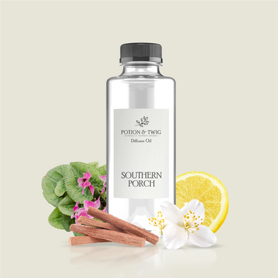 Potion & Twig diffuser oil bottle with botanical elements on a light background. Label reads Southern Porch