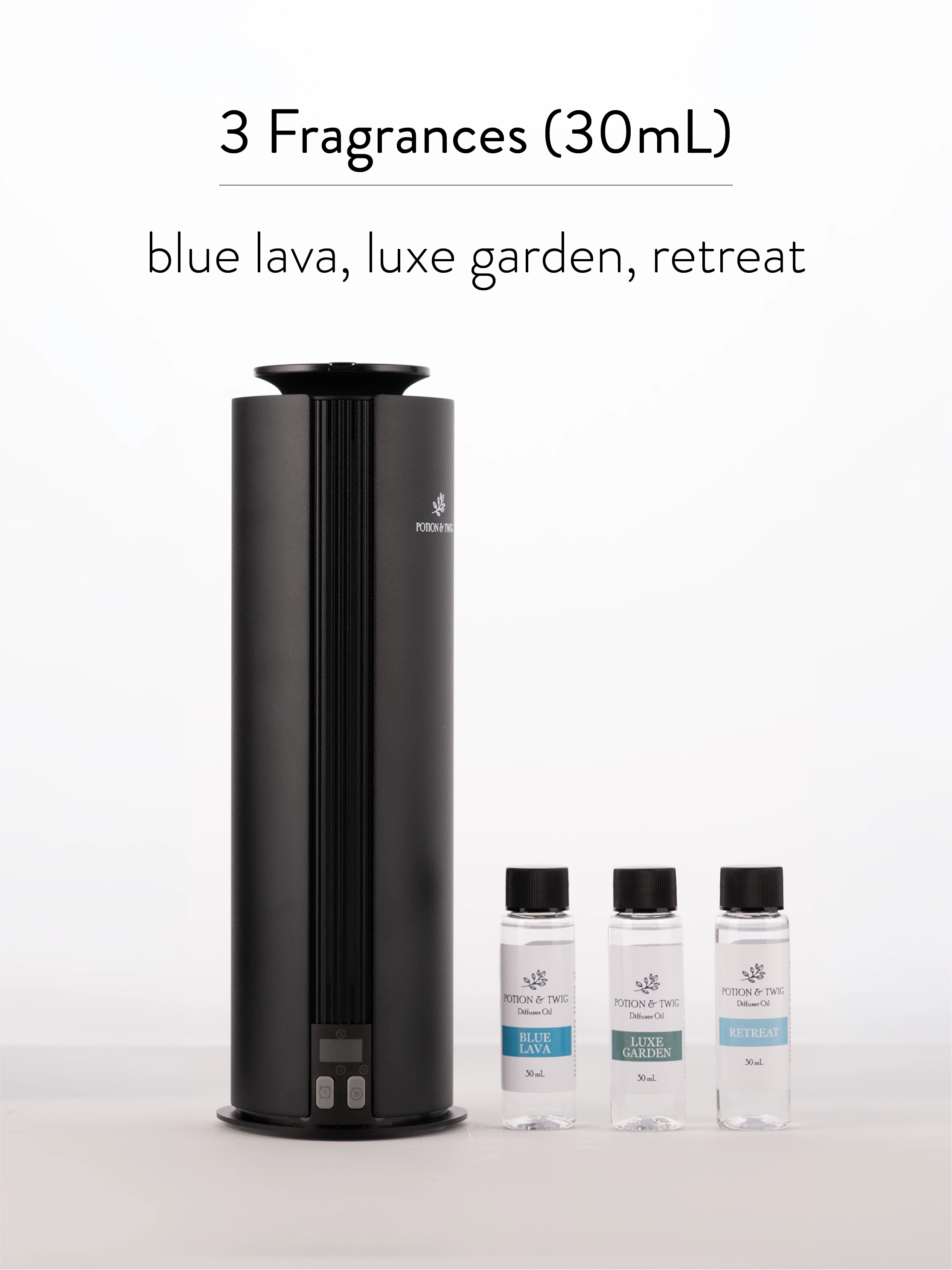 Black diffuser with three small bottles labeled 'blue lava', 'luxe garden', and 'retreat' on a white background.