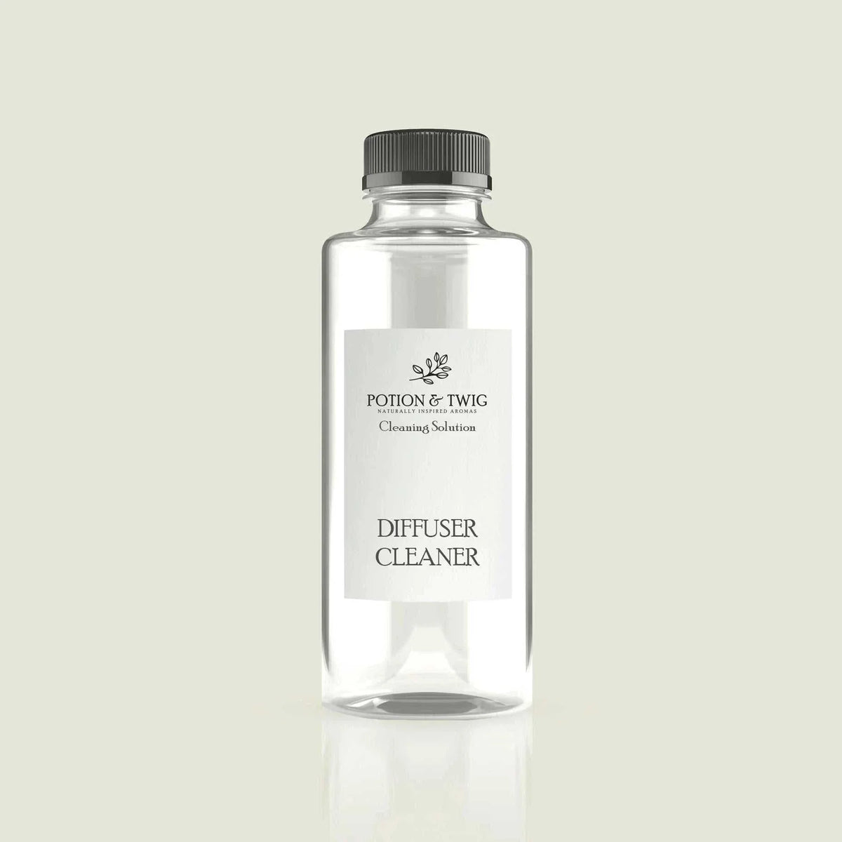 Diffuser Cleaner in a clear cylindrical bottle with a black ribbed cap and white Potion & Twig label