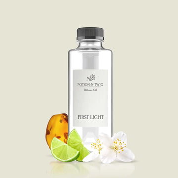 Bright sunrise with lime, jasmine, and amber notes evoking First Light fragrance