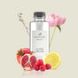 Lavish Dreams fragrance bottle drawing inspiration from The Sweetest Taboo with lemon crème and red pomegranate notes