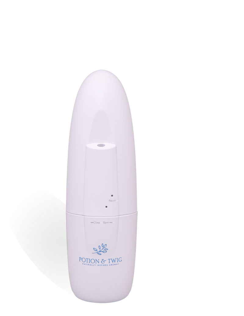 White Wall Plug-In scent diffuser with 'Potion & Twig' branding on a white background