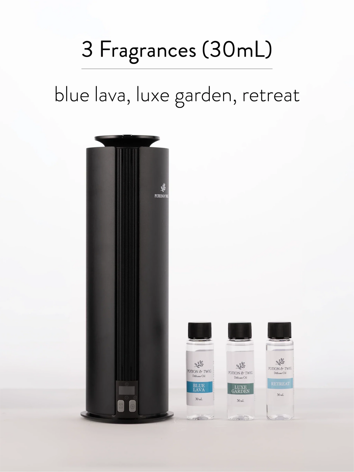 Spire Starter Pack with a tall black diffuser and three clear 30 mL fragrance bottles in blue, green, and white labels